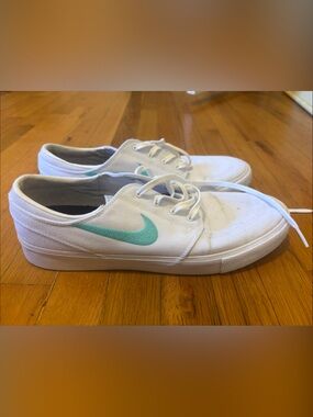 Nike White Canvas Sneakers with Mint Swoosh Accent